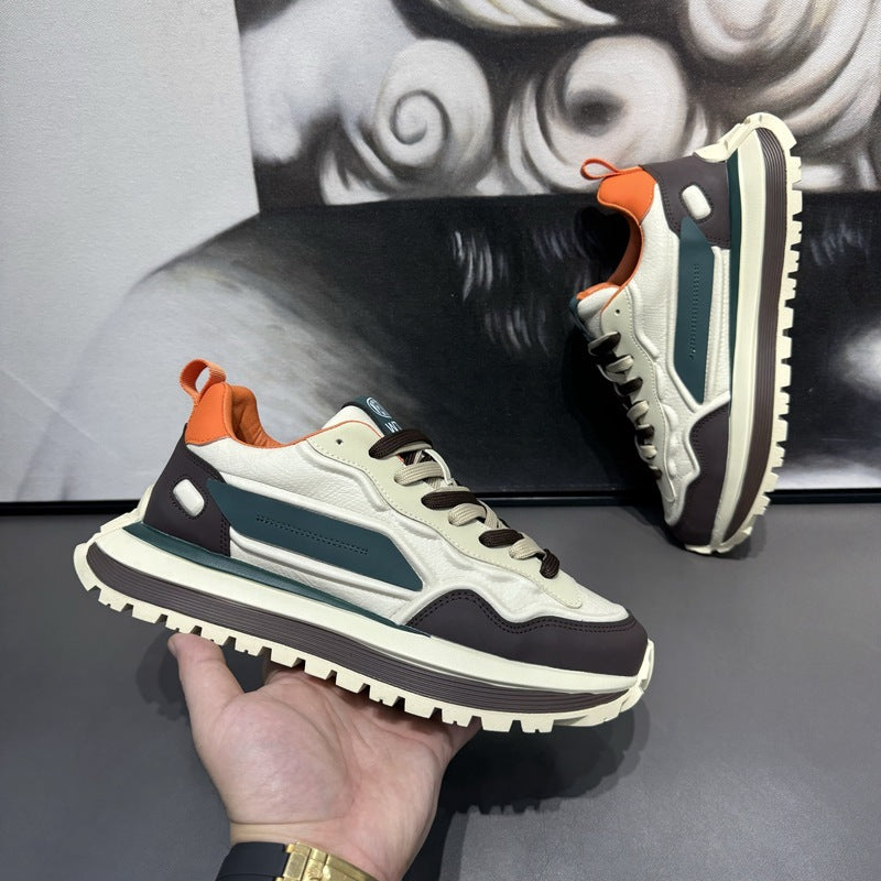 Brown orange accent men’s white sports shoes top view