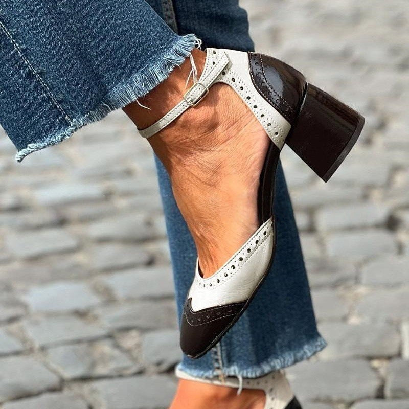 Elegant sexy style women's heels on wooden floor