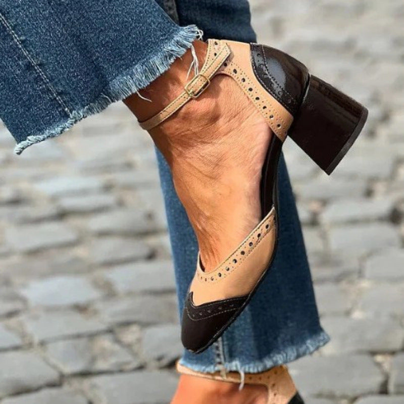 Elegant sexy style women's heels on wooden floor