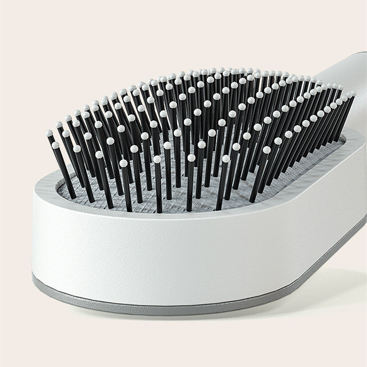 Elegant white Self Cleaning Hair Brush with one-click function